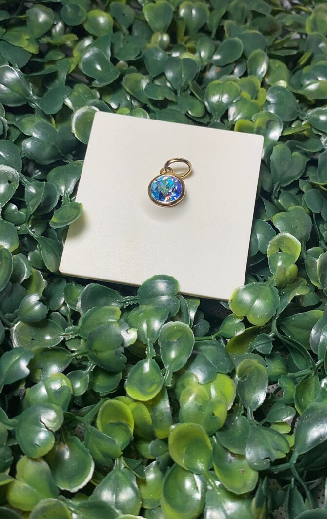 Brossway: Dije dorado con zirconia azul BTJM251