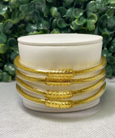 Aesthetic: Pulseras de goma doradas Z43
