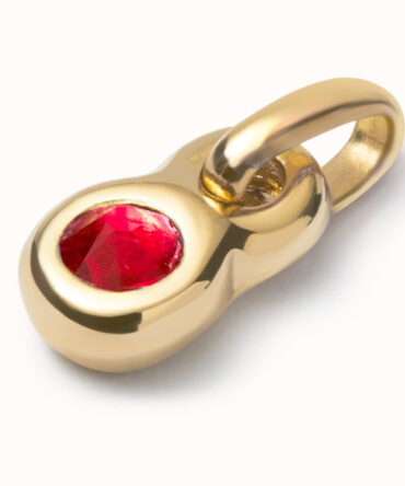 UNO DE 50 CHARM PIEDRA ROJA PEQUEÑA DORADA