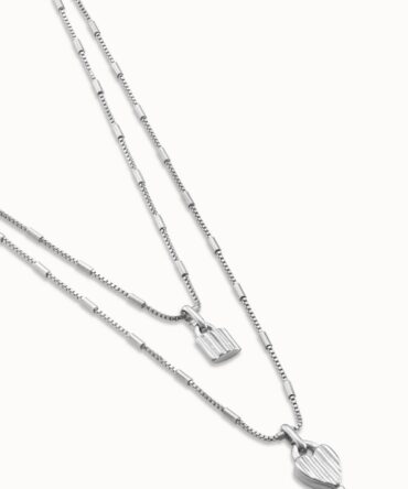 UNO DE 50: Multi strand long chain pendant necklace with charms