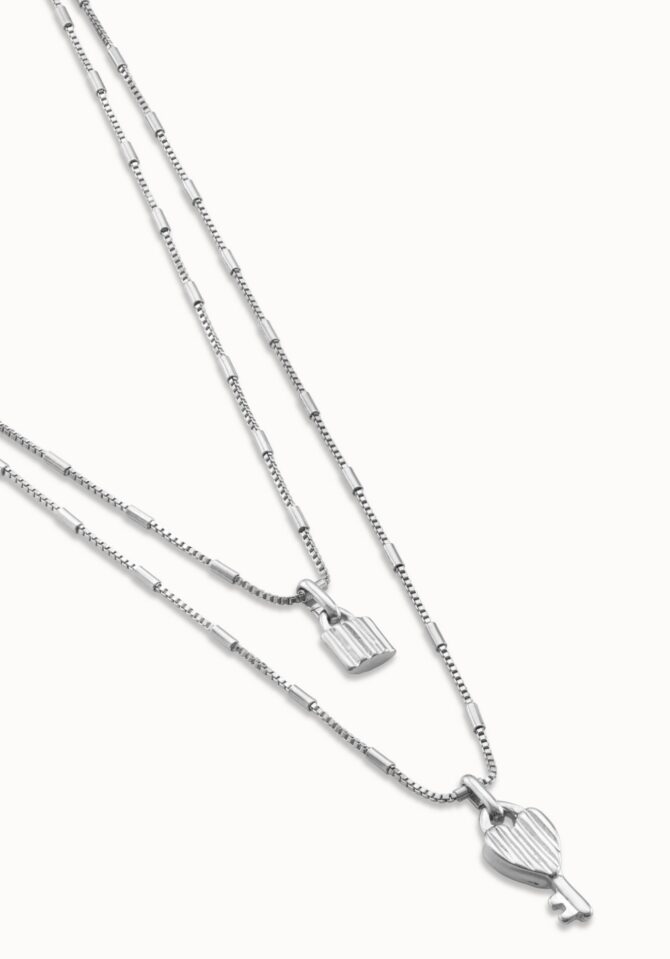 UNO DE 50: Multi strand long chain pendant necklace with charms