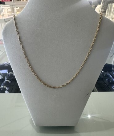 UNO DE 50 COLLAR DORADO