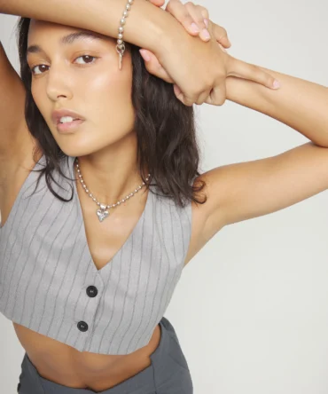 Collar con bolas bañado en plata de ley y detalle de corazón