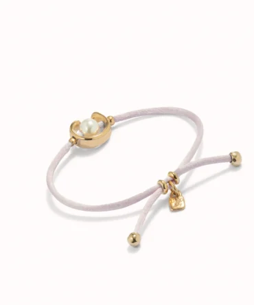 Pulsera de hilo lila con perla shell fornitura bañada en oro 18k.